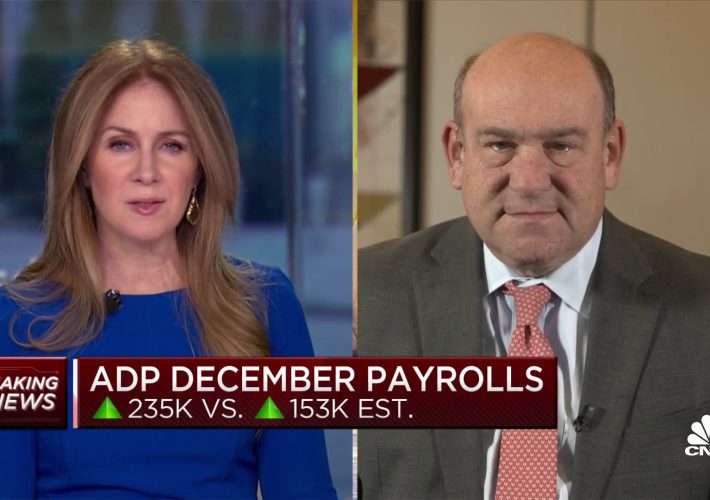 Private payroll growth surged by 235,000 in December, well above estimate, ADP reports